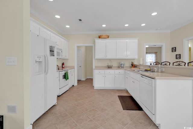 1729 Longleaf Dr, Myrtle Beach, SC 29575 - kitchen featuring white appliances, crown molding, a peninsula, a sink, and recessed lighting