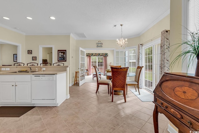 1729 Longleaf Dr, Myrtle Beach, SC 29575 - dining room featuring a chandelier, crown molding, light tile patterned floors, recessed lighting, and a textured ceiling