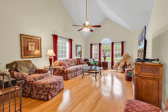 1729 Longleaf Dr, Myrtle Beach, SC 29575 - living area with high vaulted ceiling, light wood-style flooring, healthy amount of natural light, and a ceiling fan