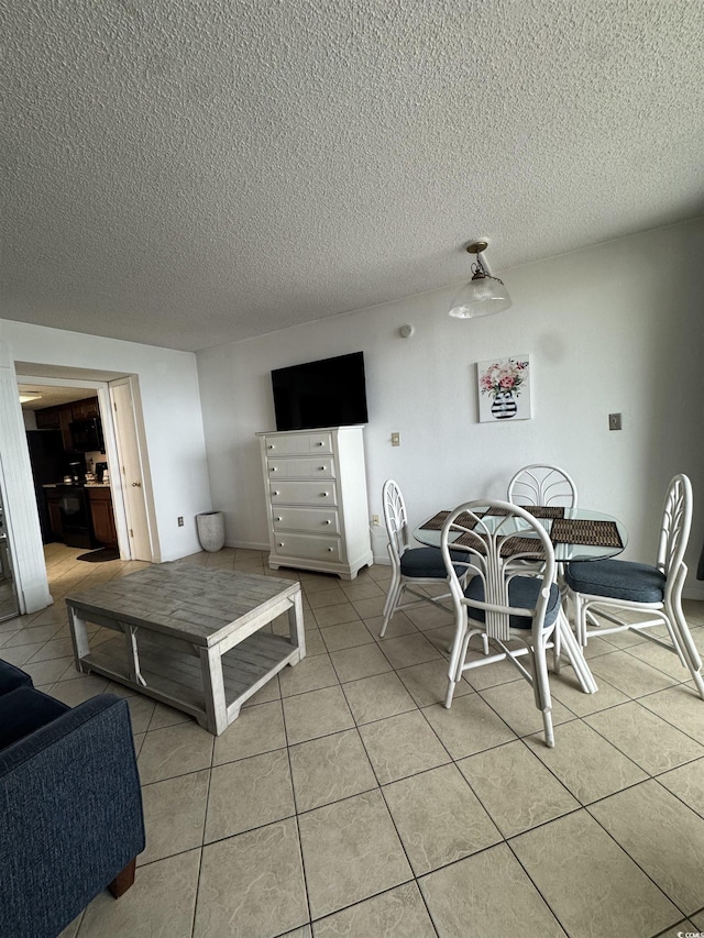 200 76th Ave N Unit 608, Myrtle Beach, SC 29572 - dining area with light tile patterned flooring and a textured ceiling