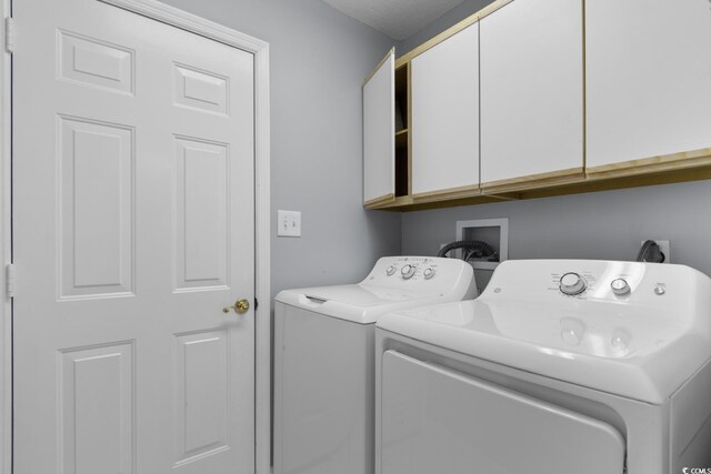 3107 Robyn Ct, Little River, SC 29566 - laundry area featuring cabinet space and washing machine and clothes dryer