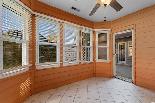 3107 Robyn Ct, Little River, SC 29566 - unfurnished sunroom featuring ceiling fan and plenty of natural light