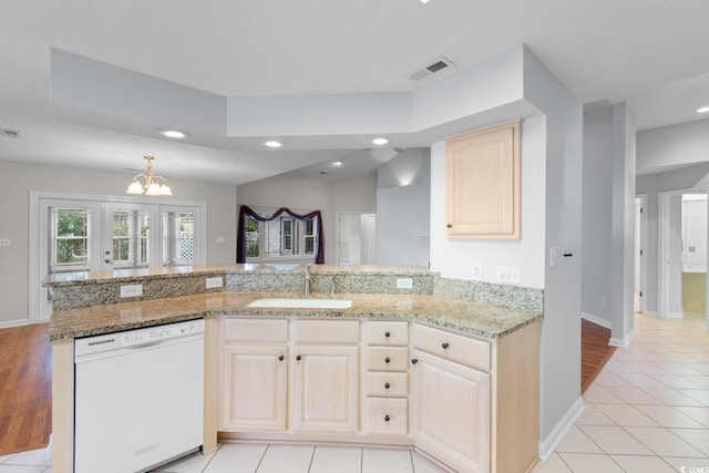 3107 Robyn Ct, Little River, SC 29566 - kitchen with dishwasher, a sink, recessed lighting, light stone countertops, and baseboards