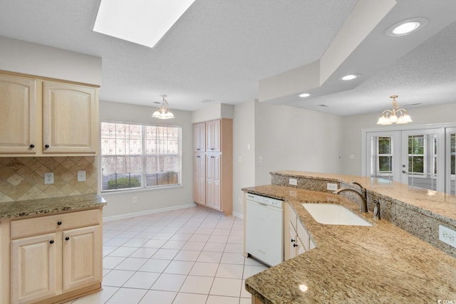 3107 Robyn Ct, Little River, SC 29566 - kitchen with a sink, a chandelier, dishwasher, light brown cabinets, and recessed lighting