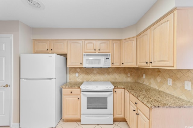 3107 Robyn Ct, Little River, SC 29566 - kitchen with white appliances, light brown cabinets, decorative backsplash, and light stone counters