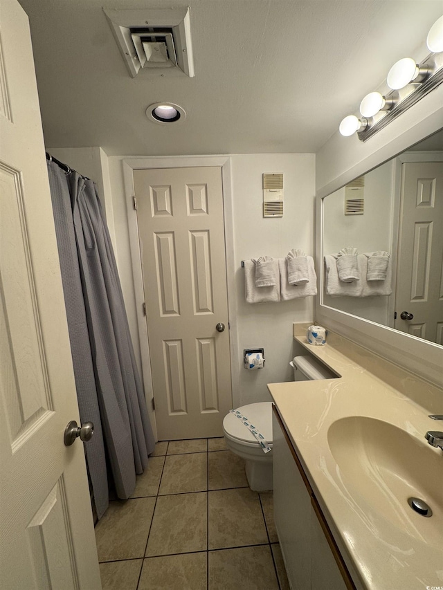 7500 N Ocean Blvd Unit 6120, Myrtle Beach, SC 29572 - full bath with tile patterned flooring, toilet, and vanity