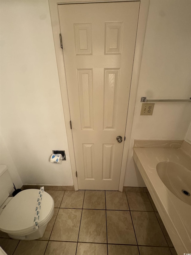 7500 N Ocean Blvd Unit 6120, Myrtle Beach, SC 29572 - bathroom featuring tile patterned flooring, toilet, and baseboards