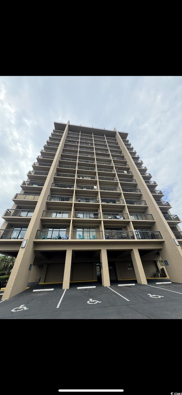 7500 N Ocean Blvd Unit 6120, Myrtle Beach, SC 29572 - view of property featuring uncovered parking