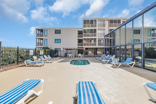 1709 S Ocean Blvd Unit 403, North Myrtle Beach, SC 29582 - view of swimming pool featuring fence, a patio, and a pool
