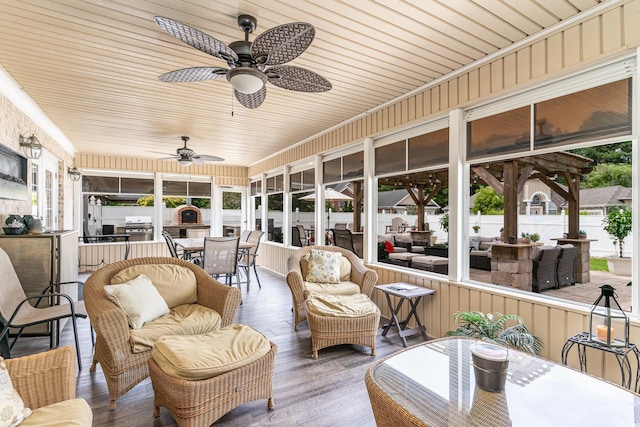 3757 Kingsley Dr, Myrtle Beach, SC 29588 - sunroom / solarium with outdoor dining space, a ceiling fan, and an outdoor kitchen