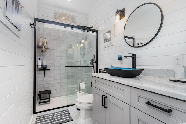3757 Kingsley Dr, Myrtle Beach, SC 29588 - bathroom featuring vanity, a stall shower, toilet, and wooden walls