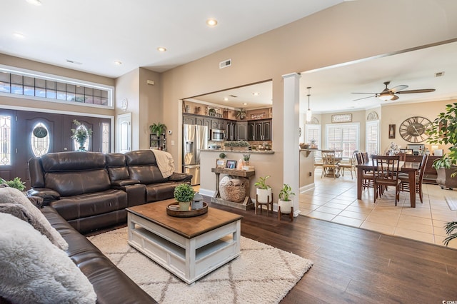 3757 Kingsley Dr, Myrtle Beach, SC 29588 - living area featuring a ceiling fan, healthy amount of natural light, recessed lighting, light wood-style floors, and baseboards