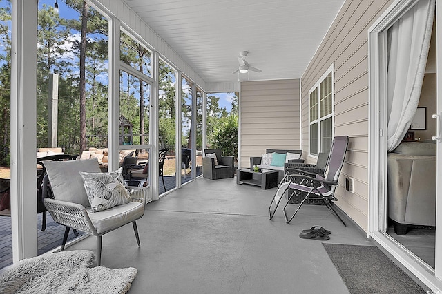 9232 Goodwill Ct, Myrtle Beach, SC 29579 - sunroom with outdoor lounge area and ceiling fan