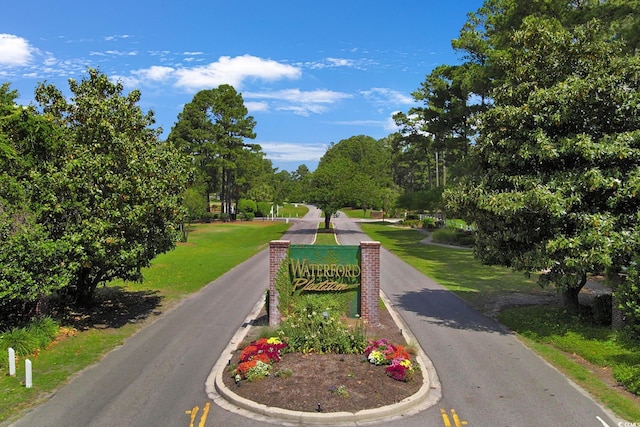 9232 Goodwill Ct, Myrtle Beach, SC 29579 - view of home's community with view of scattered trees and a lawn