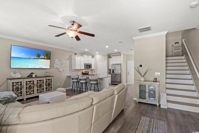 448 Papyrus Cir Unit 448, Little River, SC 29566 - living area with ceiling fan, ornamental molding, stairs, dark wood-style floors, and recessed lighting