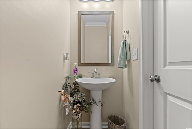 448 Papyrus Cir Unit 448, Little River, SC 29566 - bathroom featuring ornamental molding and a sink