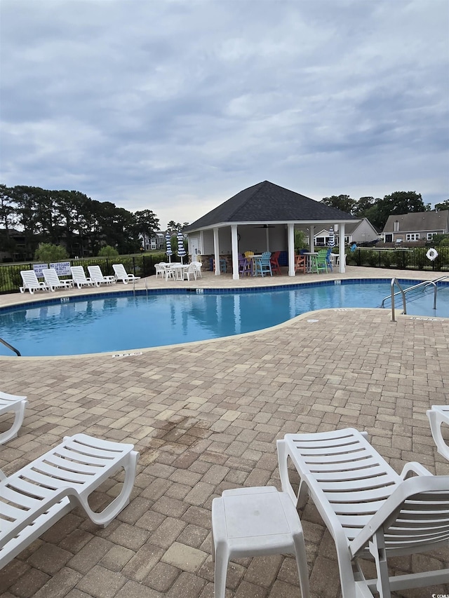 448 Papyrus Cir Unit 448, Little River, SC 29566 - community pool featuring fence and a patio area