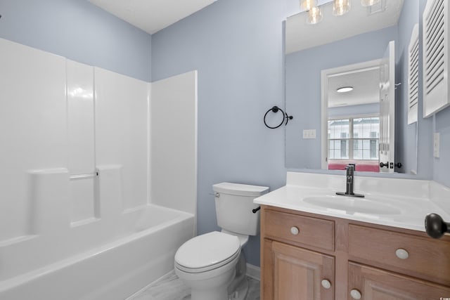full bath with toilet and vanity