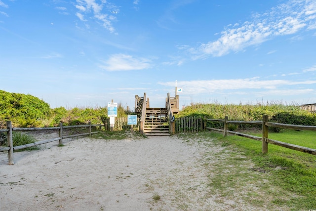 view of jungle gym with fence