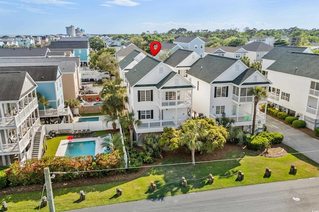 aerial perspective of suburban area with a pool area