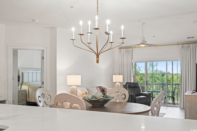 dining area featuring a chandelier