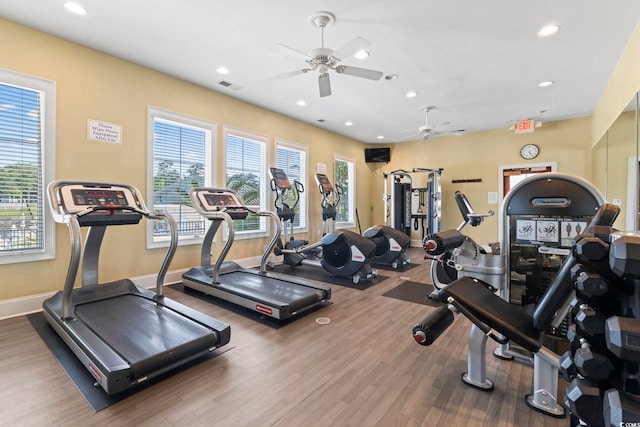 workout area with a ceiling fan, recessed lighting, baseboards, and wood finished floors