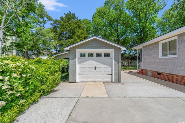 1314 Holly Dr, North Myrtle Beach, SC 29582 - detached garage with driveway
