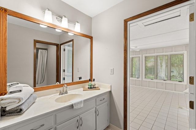 1314 Holly Dr, North Myrtle Beach, SC 29582 - bathroom featuring vanity and tile patterned floors