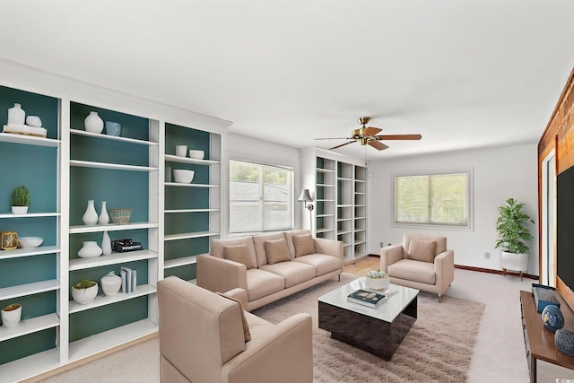 1314 Holly Dr, North Myrtle Beach, SC 29582 - living area featuring ceiling fan and baseboards