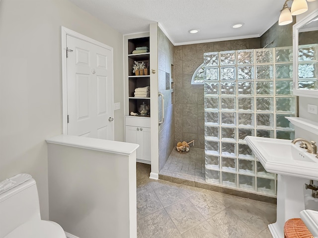full bathroom featuring walk in shower, built in shelves, a textured ceiling, recessed lighting, and toilet