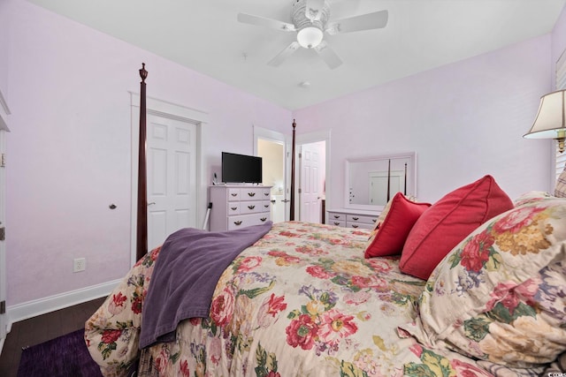 bedroom with wood finished floors, baseboards, and a ceiling fan