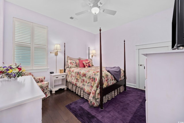 bedroom featuring dark wood-style floors and ceiling fan