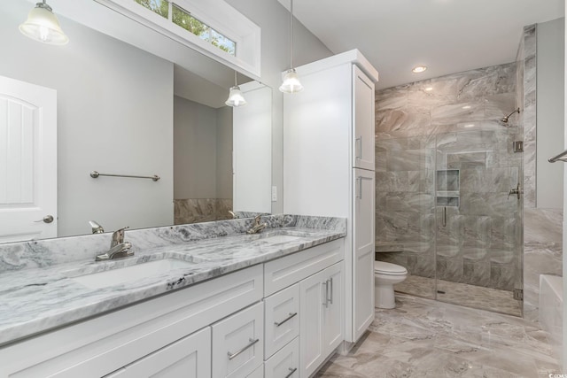 bathroom featuring marble finish flooring, a stall shower, toilet, double vanity, and recessed lighting