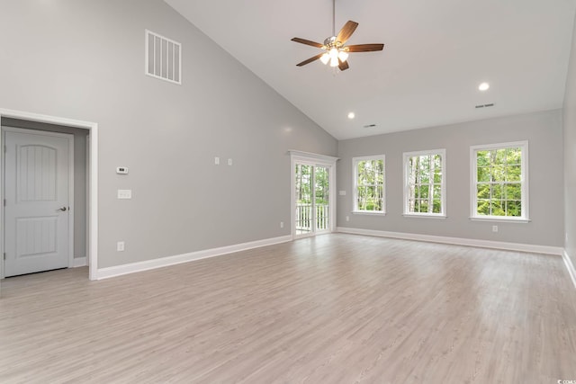 unfurnished living room featuring high vaulted ceiling, baseboards, a ceiling fan, light wood-style flooring, and recessed lighting