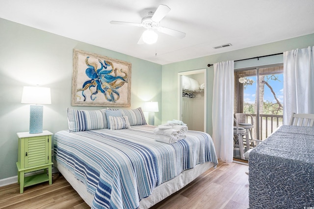 342 Pinehurst Ln Unit 12J, Pawleys Island, SC 29585 - bedroom featuring access to exterior, wood finished floors, ceiling fan, and baseboards