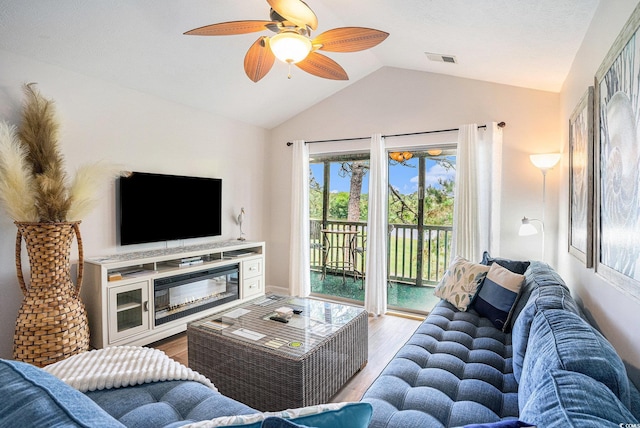 342 Pinehurst Ln Unit 12J, Pawleys Island, SC 29585 - living area featuring vaulted ceiling, wood finished floors, and ceiling fan
