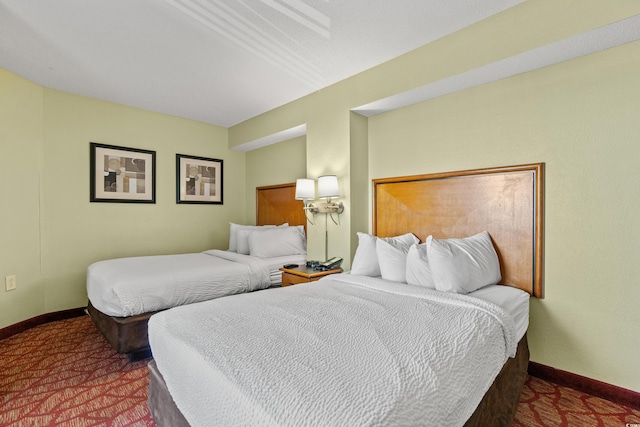 504 N Ocean Blvd N Unit 309, Myrtle Beach, SC 29577 - carpeted bedroom featuring baseboards