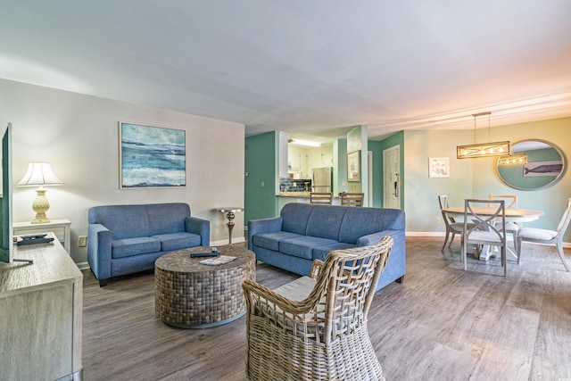2805 N Ocean Blvd Unit 113, Myrtle Beach, SC 29577 - living area with wood finished floors and baseboards