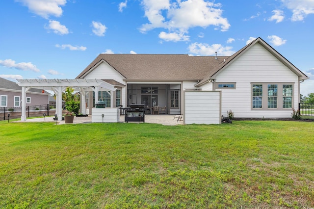 rear view of property featuring a pergola, a patio, roof with shingles, and a sunroom