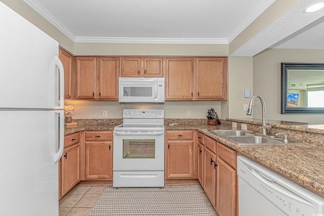 kitchen with white appliances, a sink, ornamental molding, light tile patterned flooring, and light stone counters