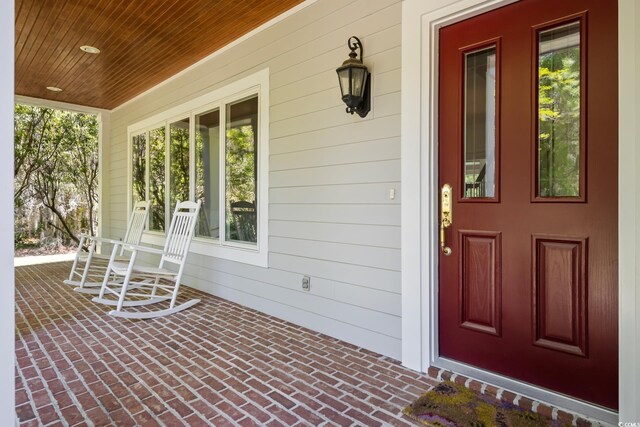 352 Old Carriage Loop, Georgetown, SC 29440 - doorway to property with covered porch