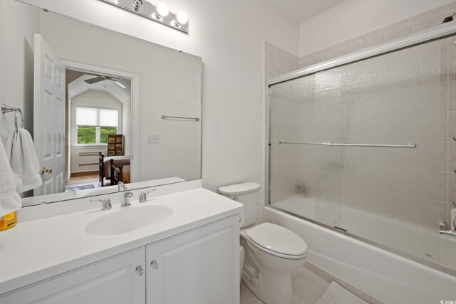 352 Old Carriage Loop, Georgetown, SC 29440 - bathroom with ceiling fan, connected bathroom, enclosed tub / shower combo, toilet, and vanity