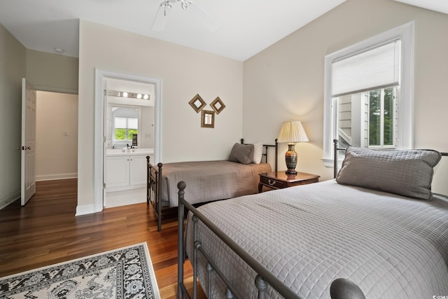 352 Old Carriage Loop, Georgetown, SC 29440 - bedroom featuring wood finished floors, connected bathroom, and baseboards