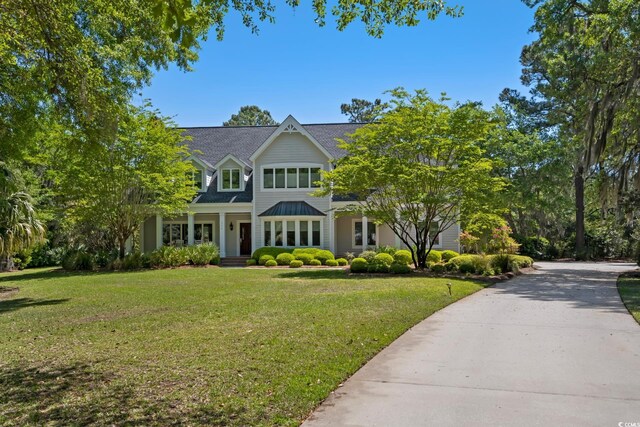 352 Old Carriage Loop, Georgetown, SC 29440 - view of front of house with a front yard, covered porch, and concrete driveway