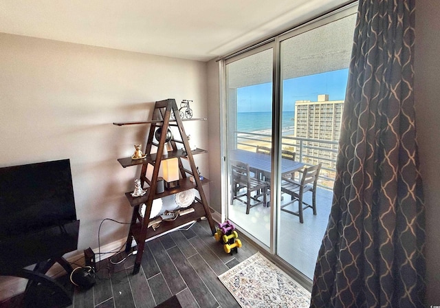 9840 Queensway Blvd Unit 1505, Myrtle Beach, SC 29572 - interior space with dark wood-style floors and floor to ceiling windows