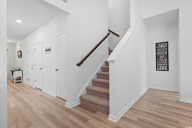 452 Sun Colony Blvd, Longs, SC 29568 - stairs featuring wood finished floors, baseboards, and recessed lighting