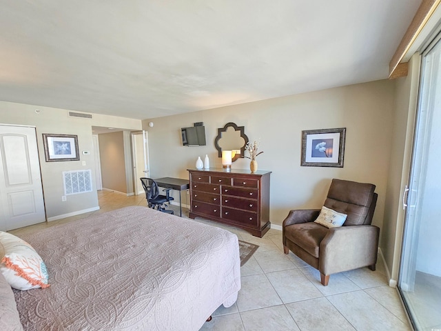 9820 Queensway Blvd Unit 1603, Myrtle Beach, SC 29572 - bedroom with light tile patterned floors and baseboards