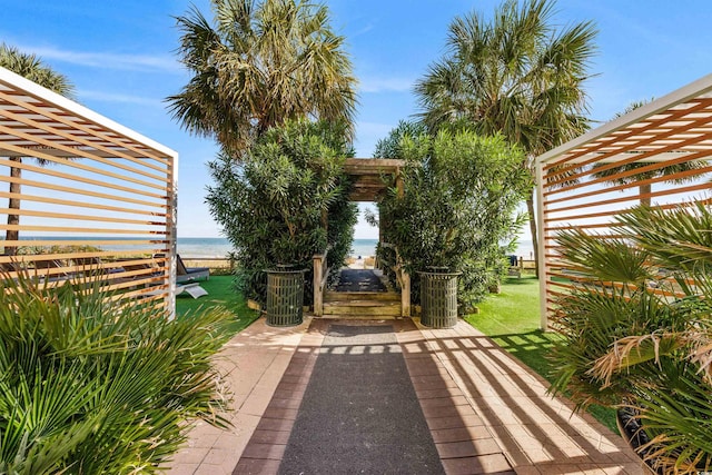 2701 N Ocean Blvd Unit 1260, Myrtle Beach, SC 29577 - gate with a water view and a yard