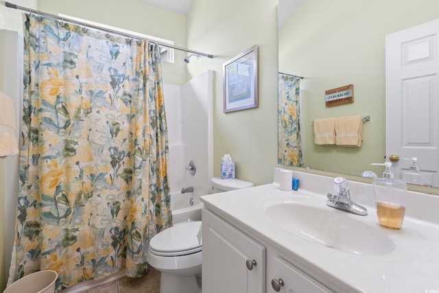 bathroom featuring toilet, tile patterned flooring, shower / bath combo, and vanity