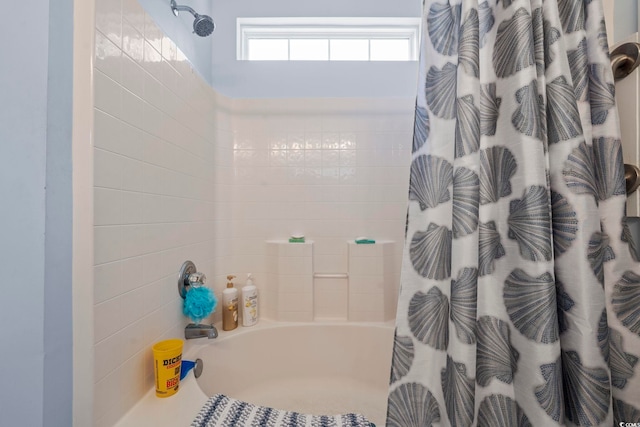 bathroom featuring shower / tub combo with curtain